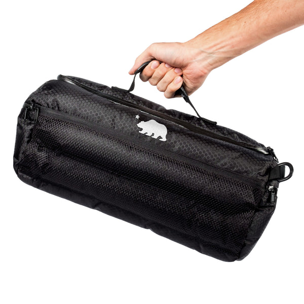 Large duffle in hand